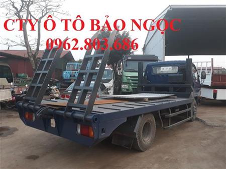 xe hyundai mighty nâng đầu chở máy công trình