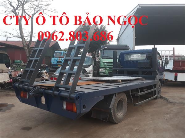 xe hyundai mighty nâng đầu chở máy công trình